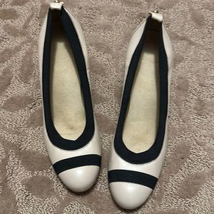 Stuart Weitzman heels- beige with black trim. Never worn. Size 9M
